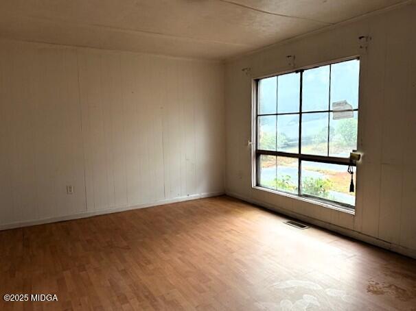 427 Gun Club Road Fort Valley, GA 31030 - Photo 5 of 12 an empty room with a window