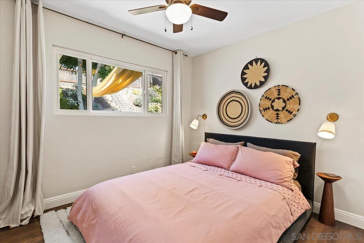 12243 Buckskin Trail Poway, CA 92064 - Photo 36 of 41 a bedroom with a bed and a window