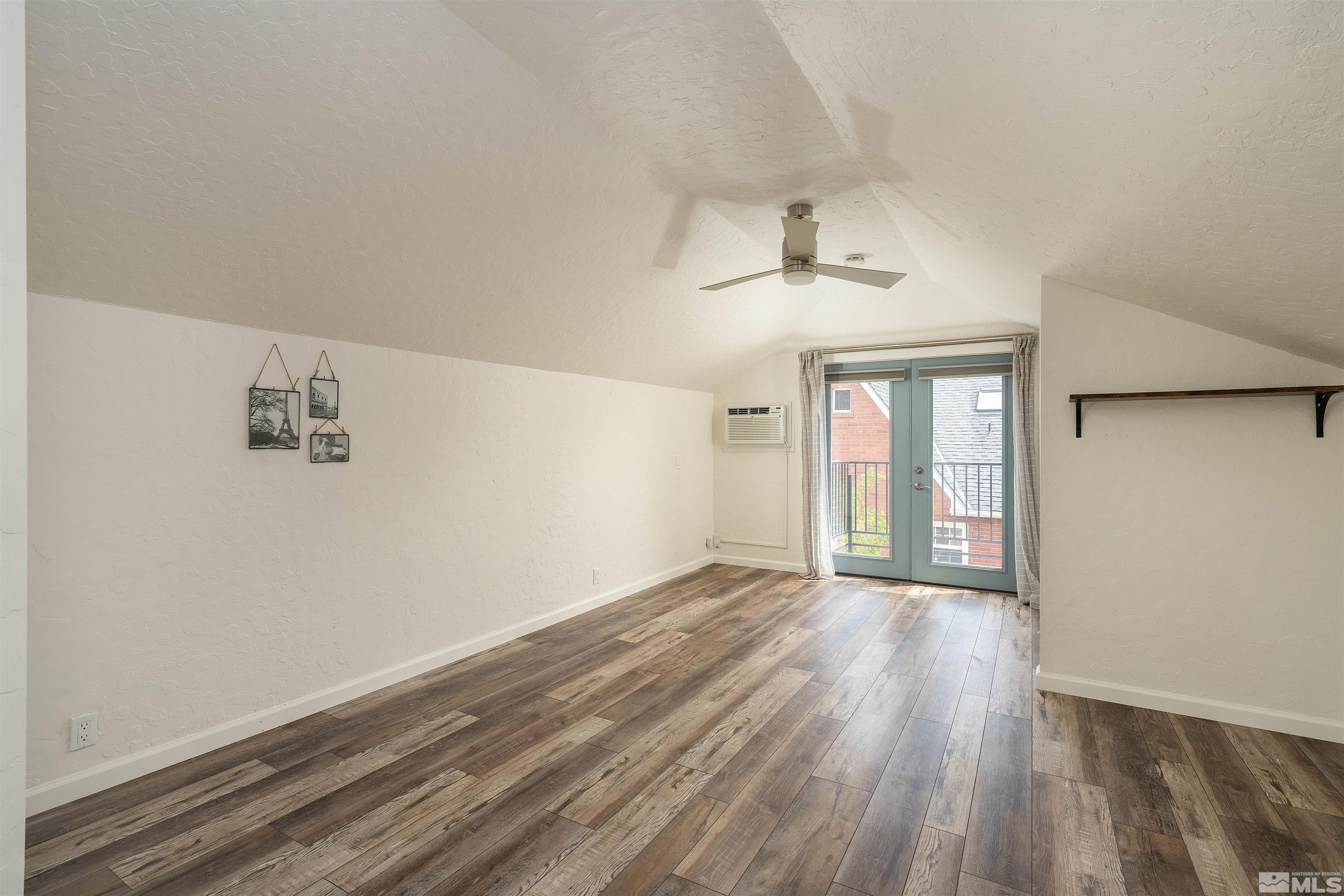 1015 Gordon Avenue Reno, NV 89509 - Photo 23 of 29 wooden floor in an empty room with a window