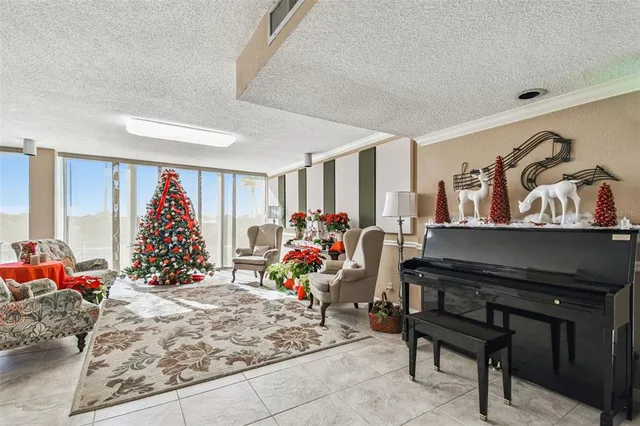 a view of a livingroom with furniture and a rug