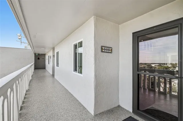 a view of hallway with livingroom