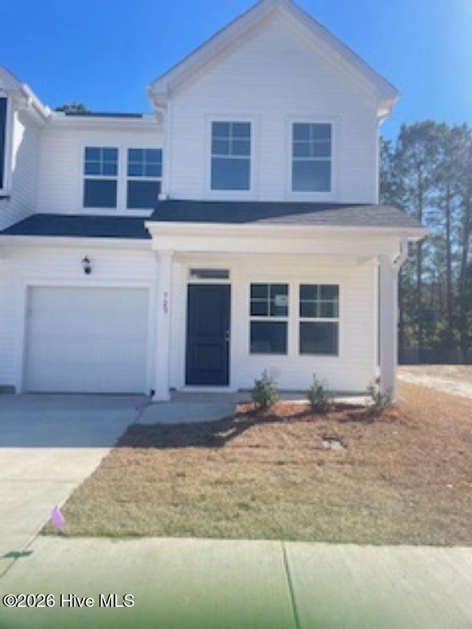 832 Palm Frond Way Calabash, NC 28467 - Photo 1 of 25 Front, end unit, actual homesite