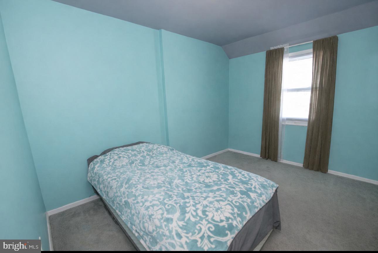 618 Cedar Avenue Croydon, PA 19021 - Photo 14 of 14 a bedroom with a bed and a window