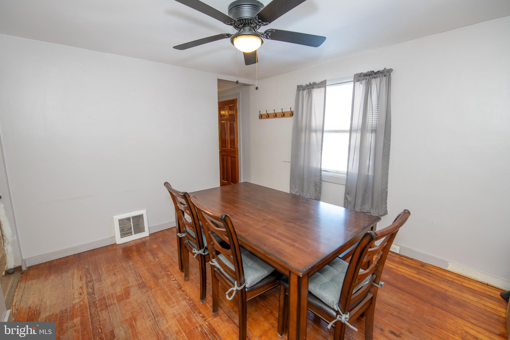 618 Cedar Avenue Croydon, PA 19021 - Photo 8 of 14 a view of a dining room with furniture and wooden floor