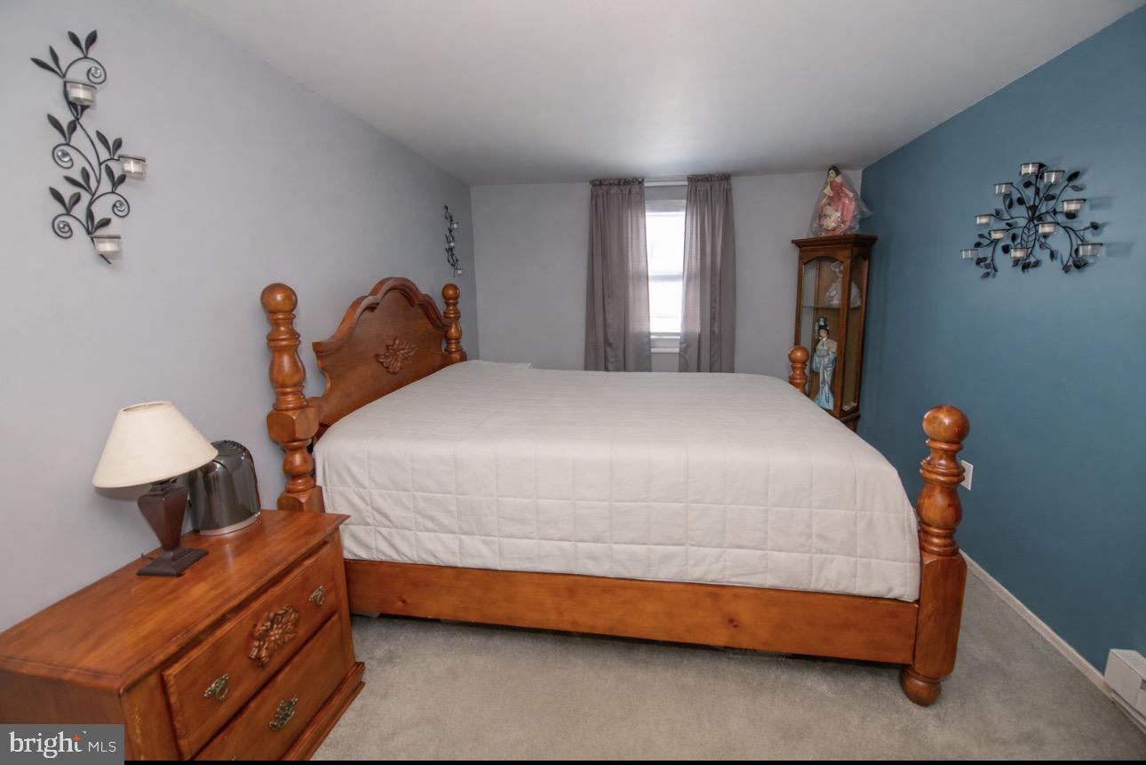 618 Cedar Avenue Croydon, PA 19021 - Photo 9 of 14 a bedroom with a bed and a window
