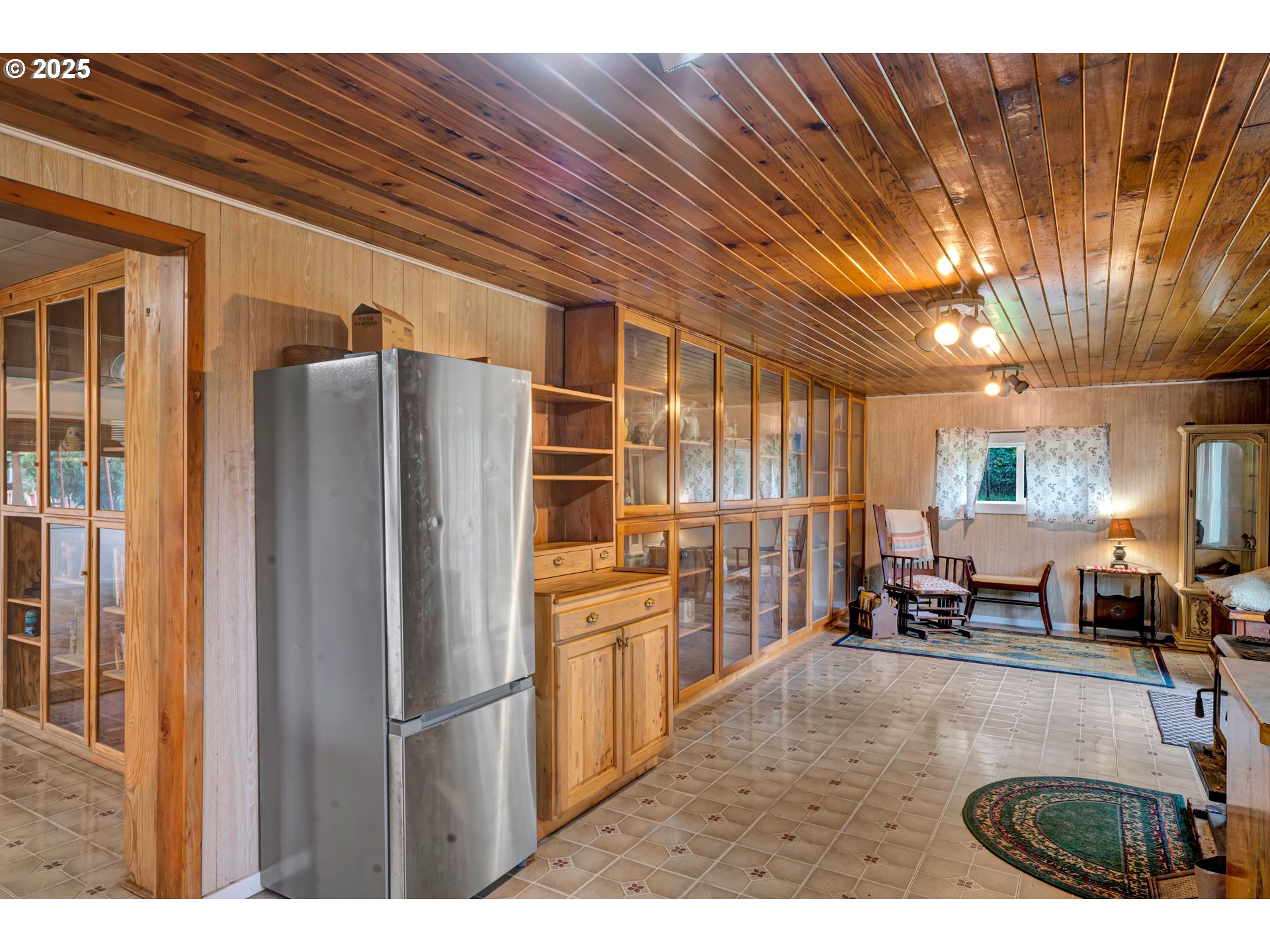 32253 Deberry Road Creswell, OR 97426 - Photo 20 of 43 a kitchen with stainless steel appliances granite countertop a refrigerator a sink a stove and a refrigerator with wooden cabinets