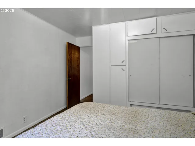 a bathroom with a sink vanity and a mirror