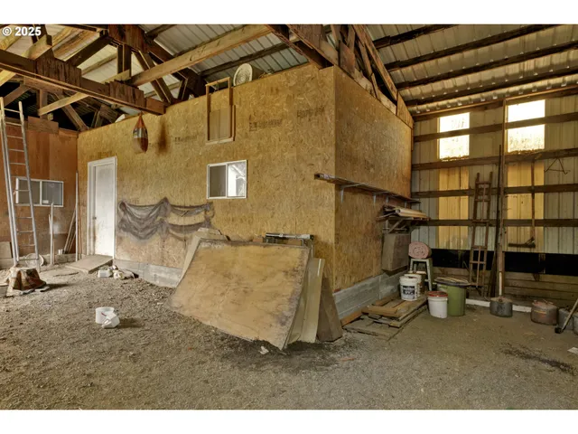 a bathroom with a shower and a sink