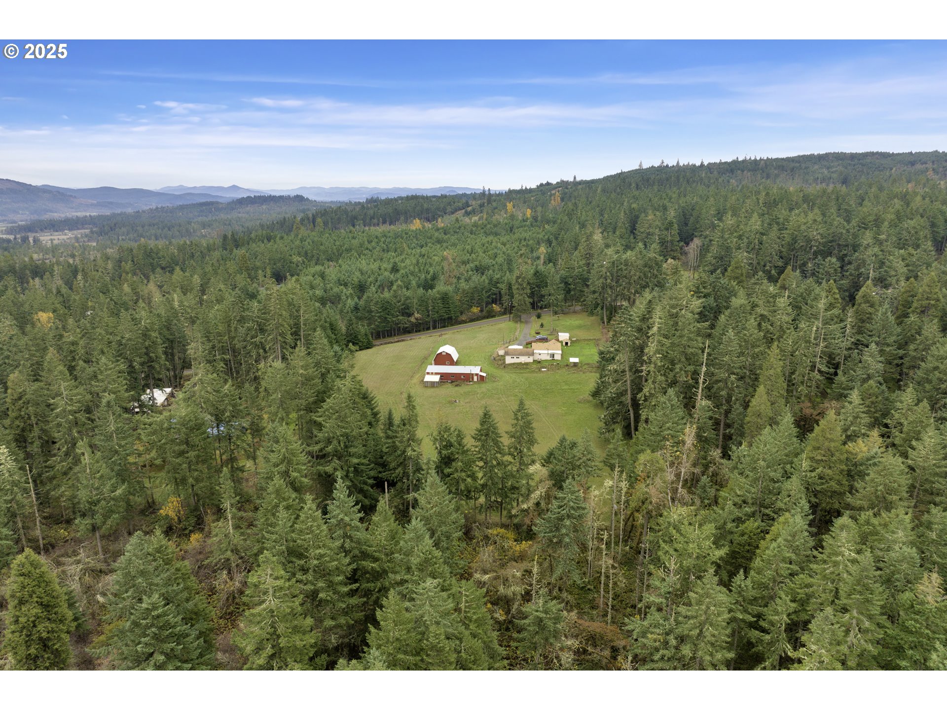32253 Deberry Road Creswell, OR 97426 - Photo 42 of 43 a view of a city with lush green forest
