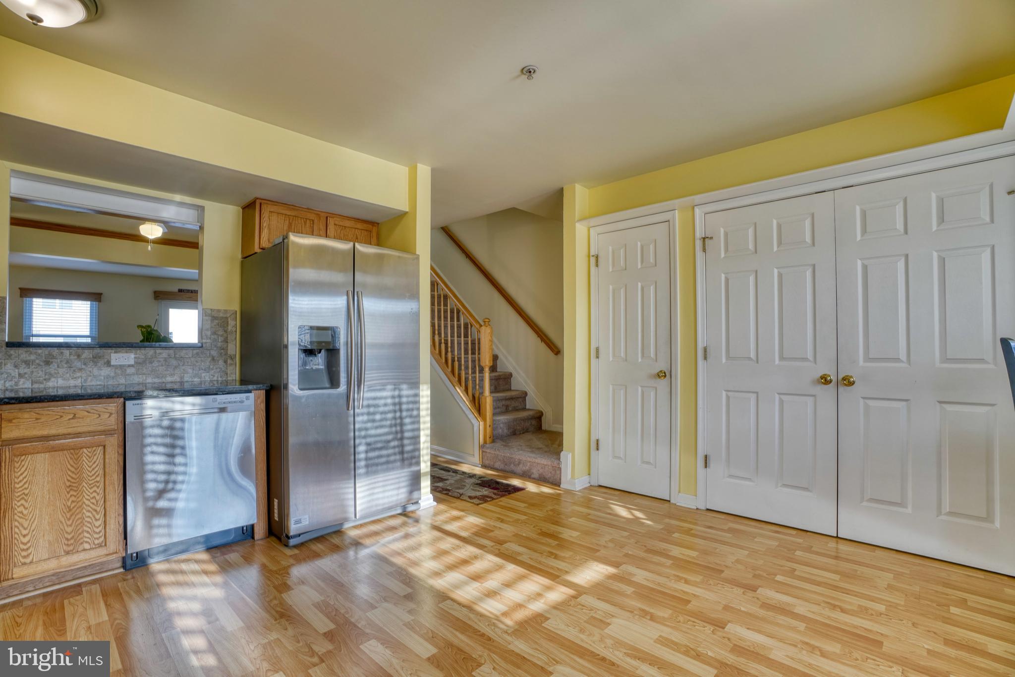 655 Hunting Fields Road Middle River, MD 21220 - Photo 23 of 48 Kitchen with washer and dryer in closet