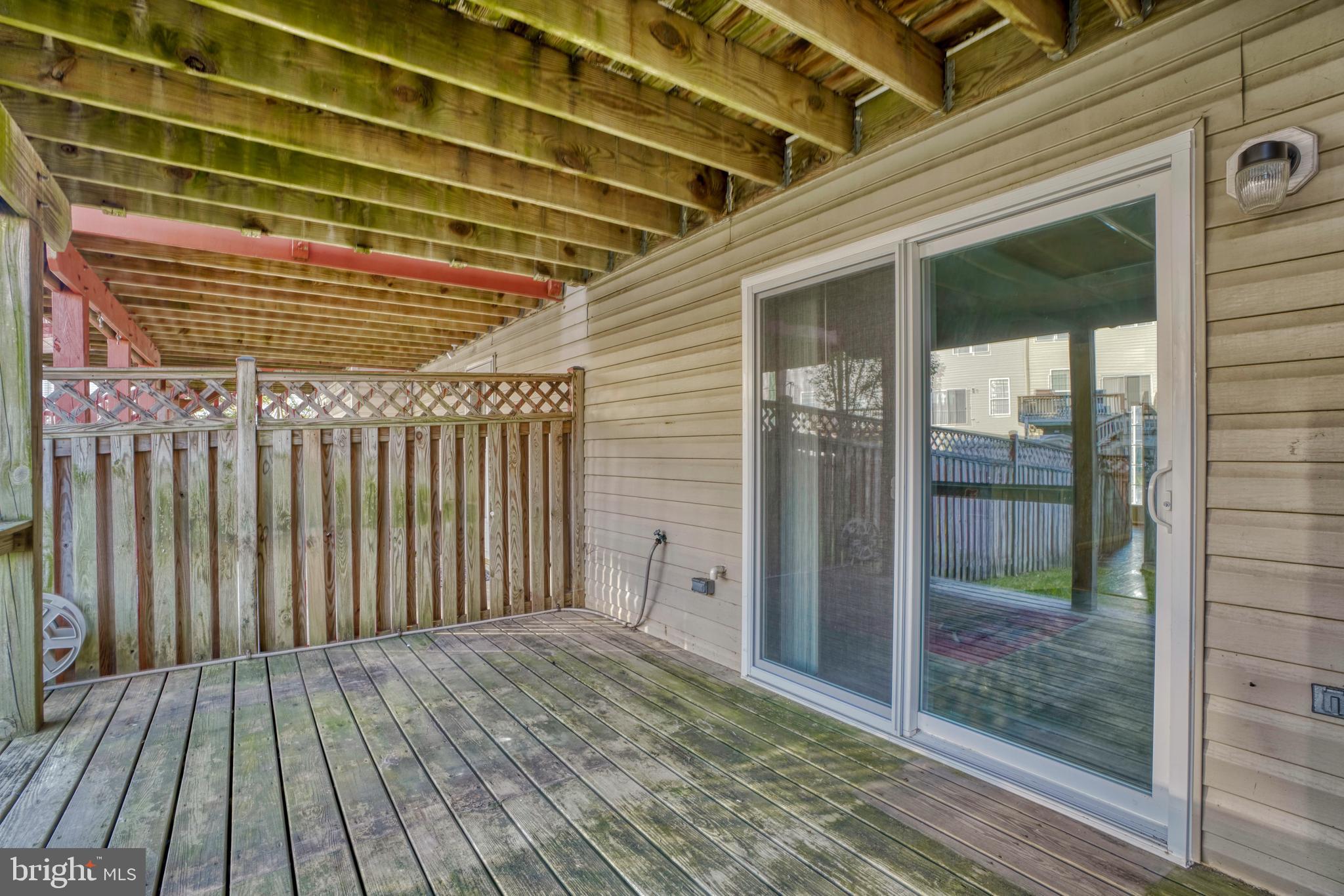 655 Hunting Fields Road Middle River, MD 21220 - Photo 47 of 48 Ground level wooden deck off of entertainment room