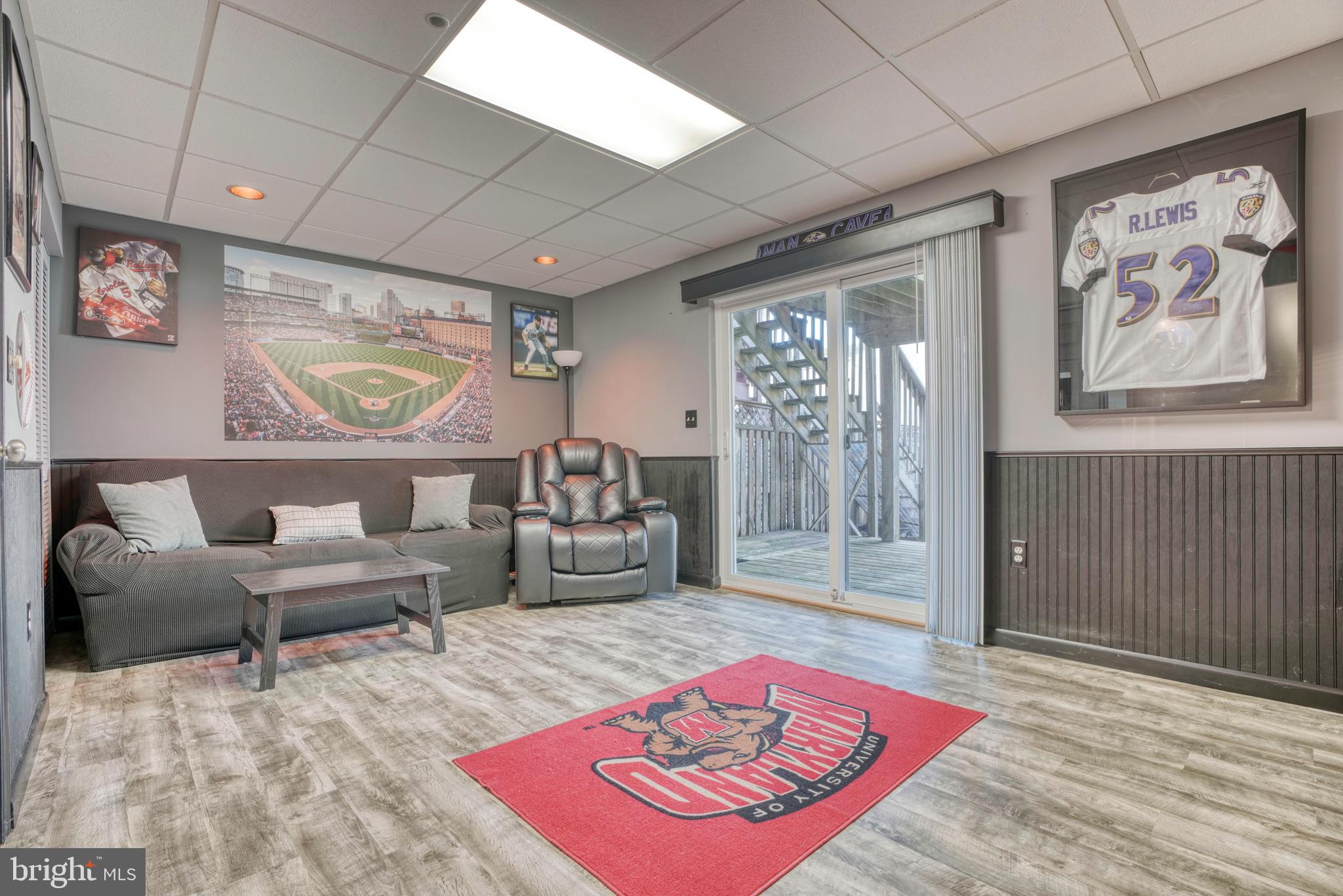 655 Hunting Fields Road Middle River, MD 21220 - Photo 7 of 48 Entertainment room with new sliders to rear deck