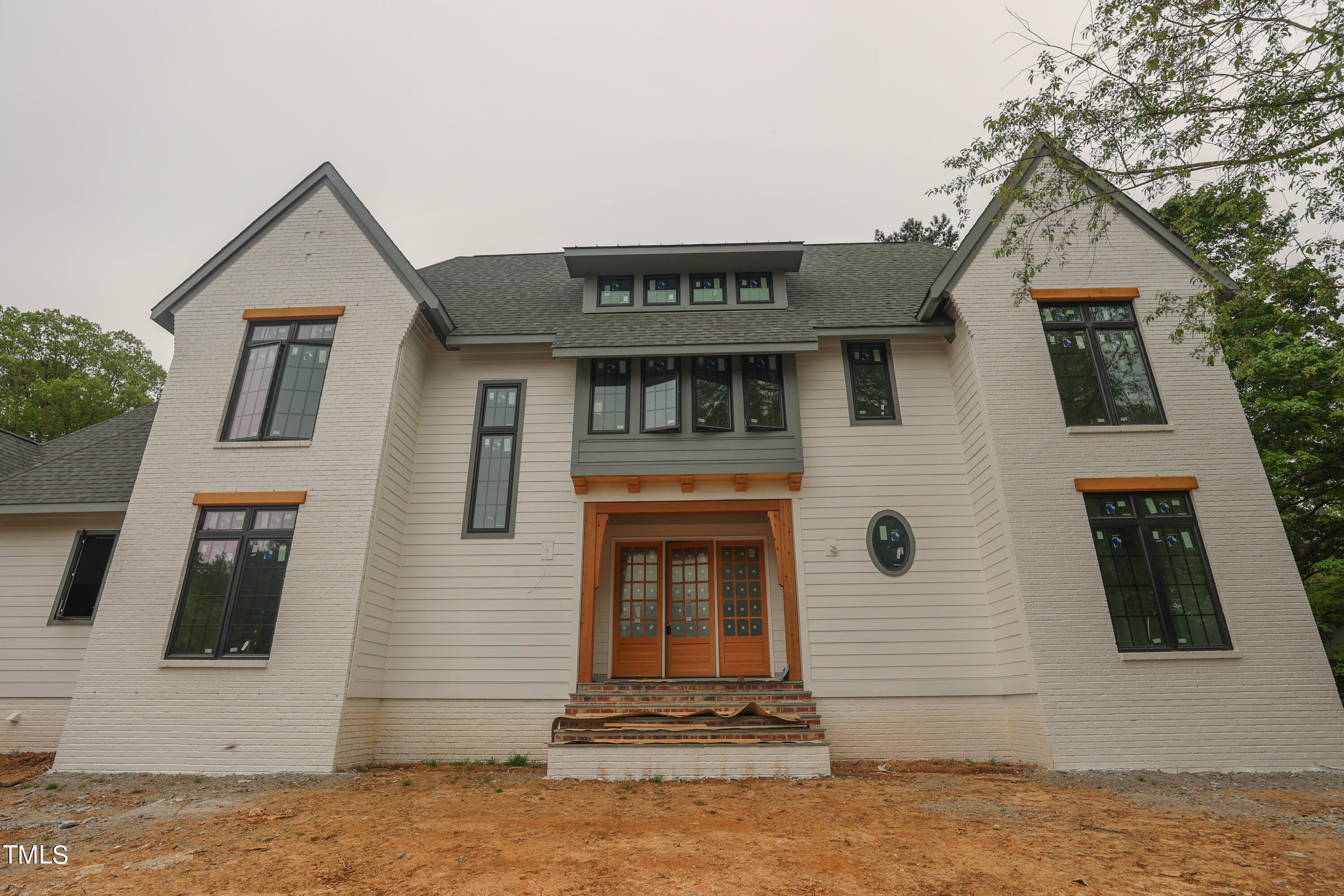 601 Davidson Street Raleigh, NC 27609 - Photo 23 of 41 a front view of a house with a balcony