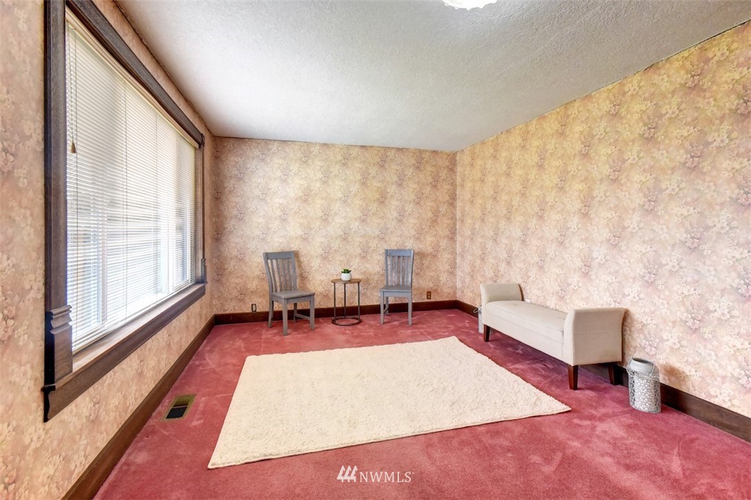 6830 Cady Road Everett, WA 98203 - Photo 14 of 28 a living room with furniture and a large window