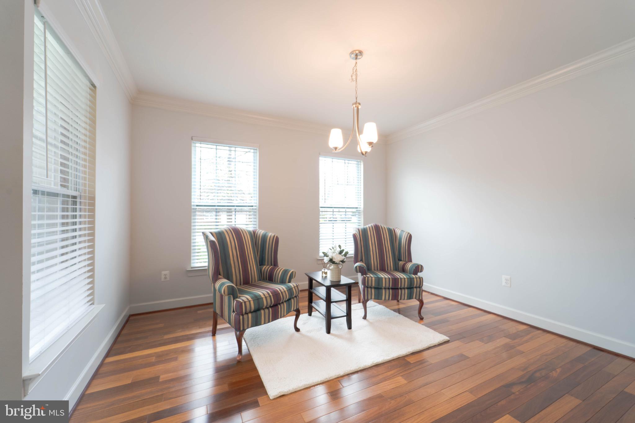 16309 Sandy Ridge Court Woodbridge, VA 22191 - Photo 7 of 93 a view of a livingroom with furniture window and wooden floor