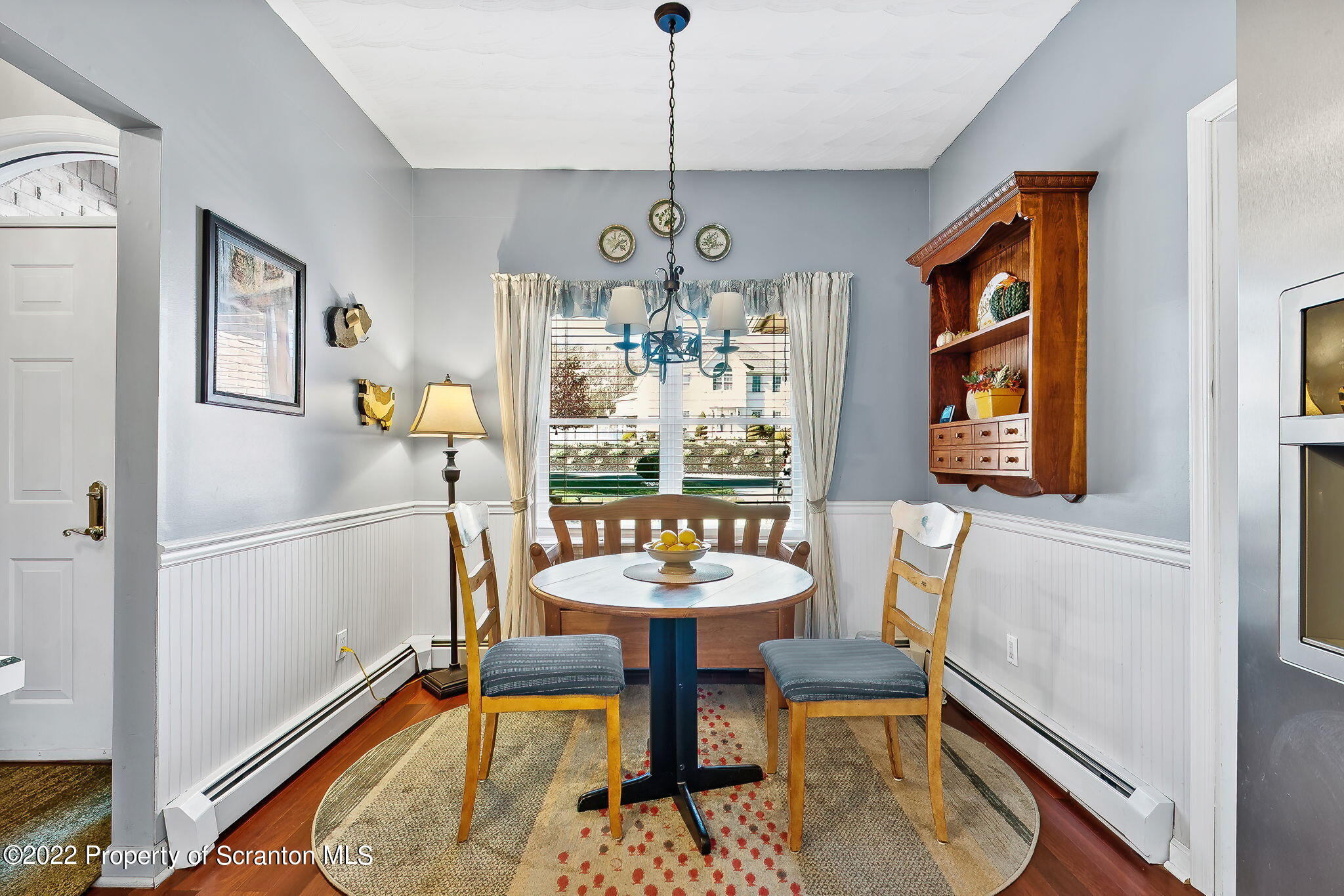 131 Ridgeview Drive Scranton, PA 18504 - Photo 11 of 32 a view of a dining room with furniture and a chandelier