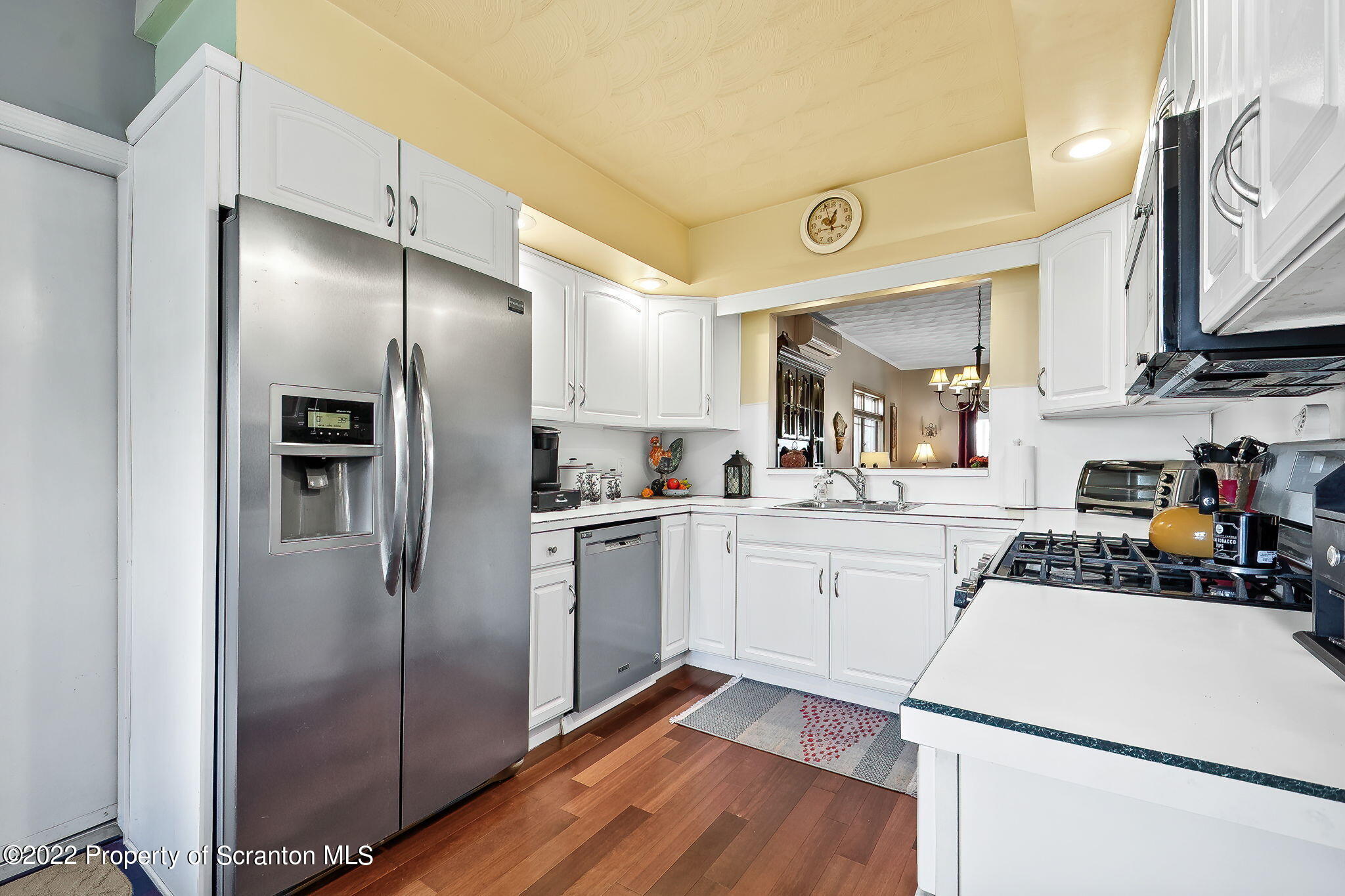 131 Ridgeview Drive Scranton, PA 18504 - Photo 12 of 32 a kitchen with a refrigerator sink and cabinets