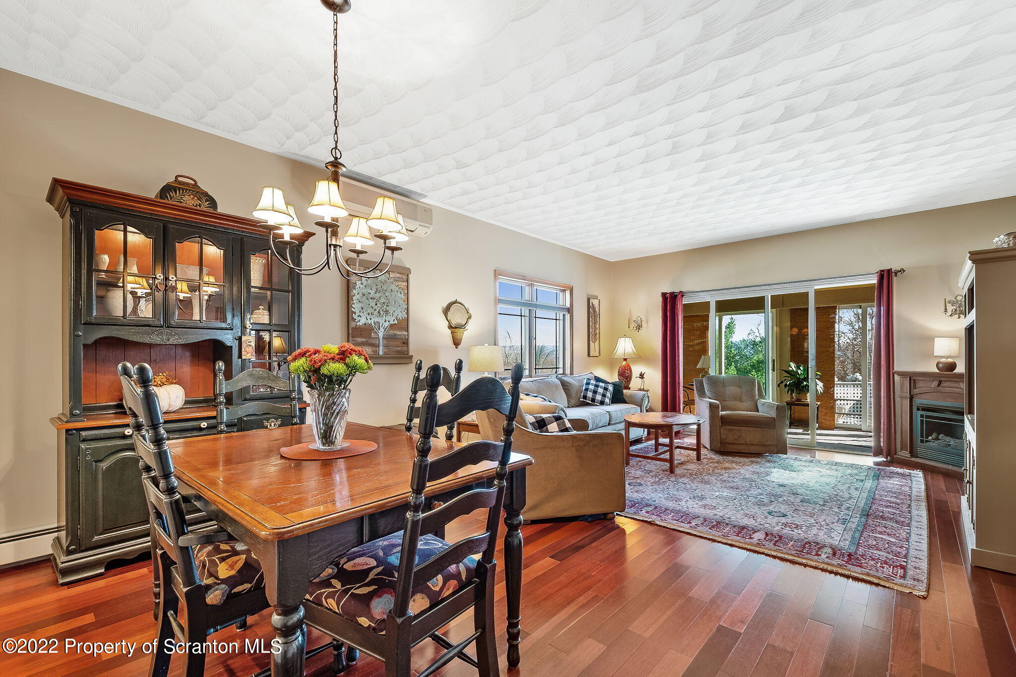 131 Ridgeview Drive Scranton, PA 18504 - Photo 15 of 32 a dining room with furniture a chandelier and wooden floor