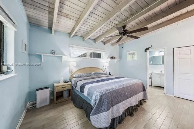 a bedroom with a bed and a closet