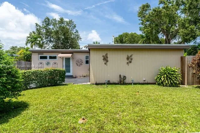 a view of outdoor space and yard