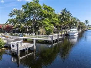a view of a garden with an outdoor seating