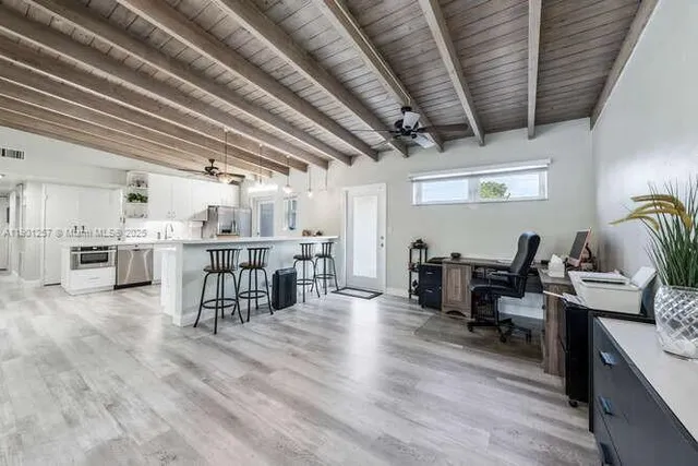 a view of a dining room with furniture