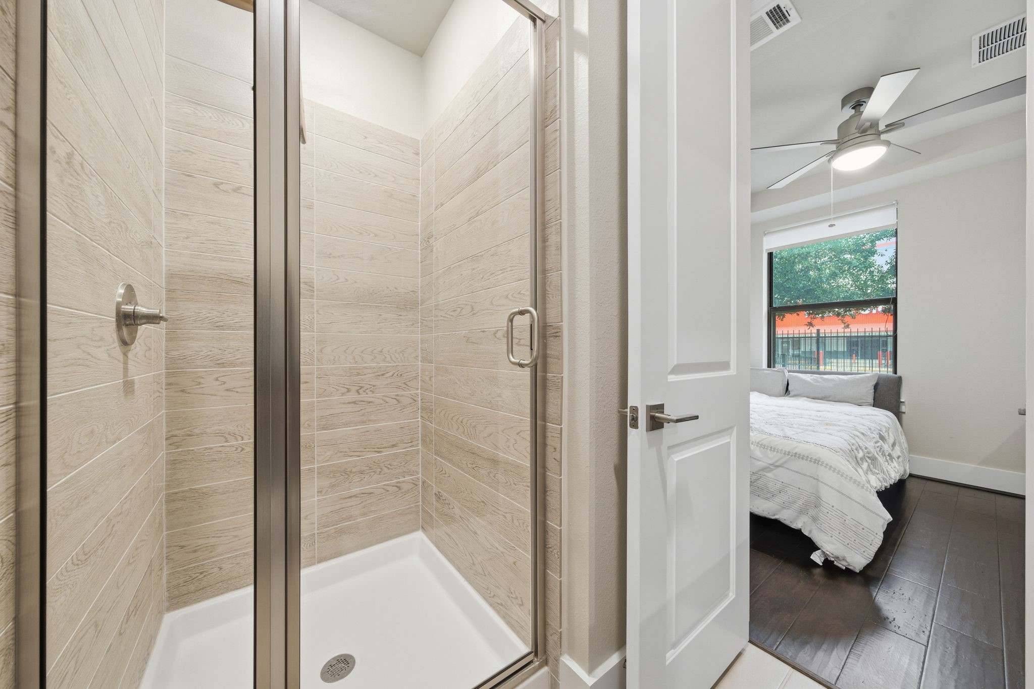 2401 Crawford Street, Unit C1C Houston, TX 77004 - Photo 6 of 24 a en suite bathroom with a tub shower and a sink