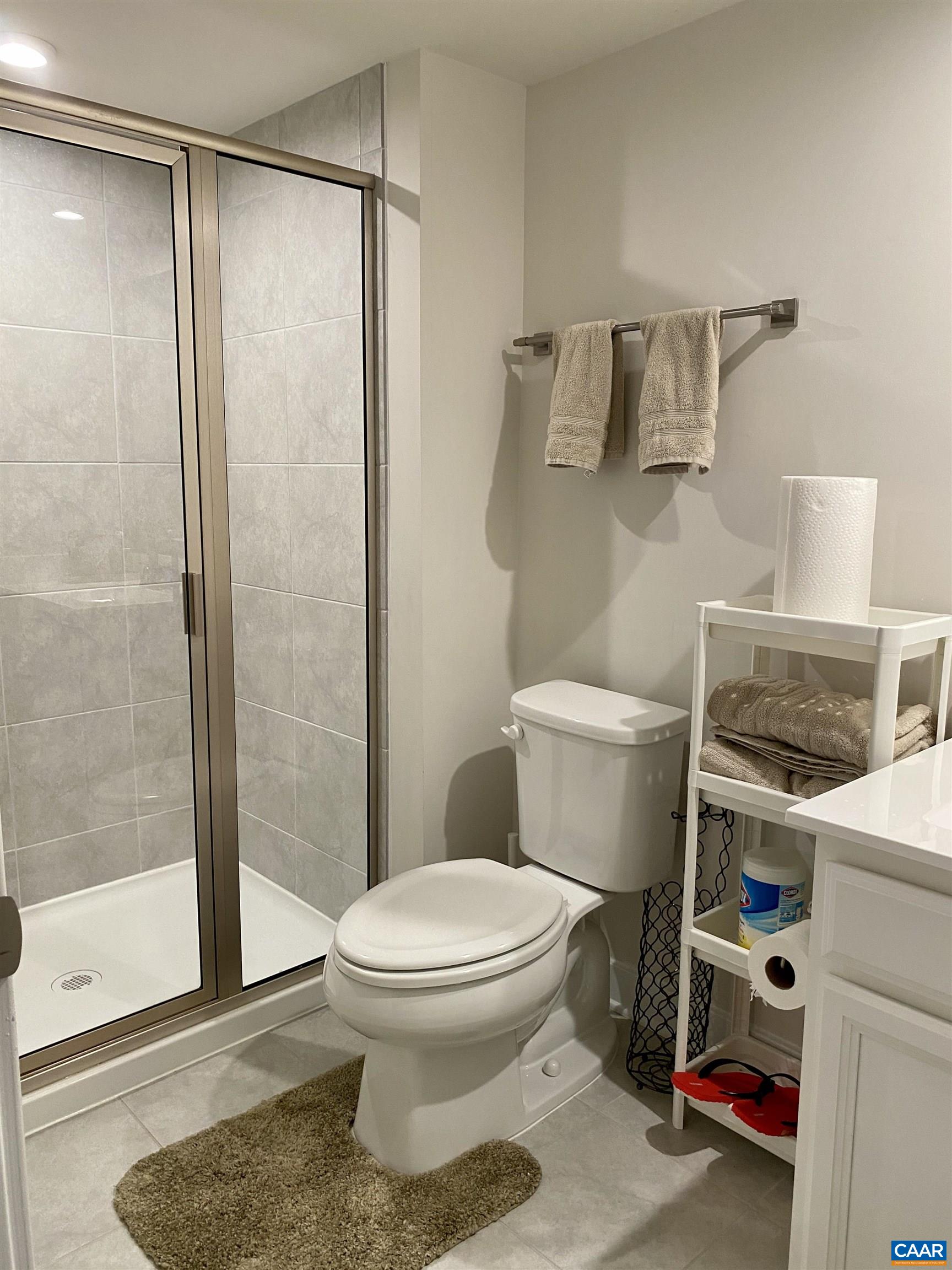 3402 Steamer Drive Keswick, VA 22947 - Photo 20 of 27 a white toilet sitting next to a bathroom sink