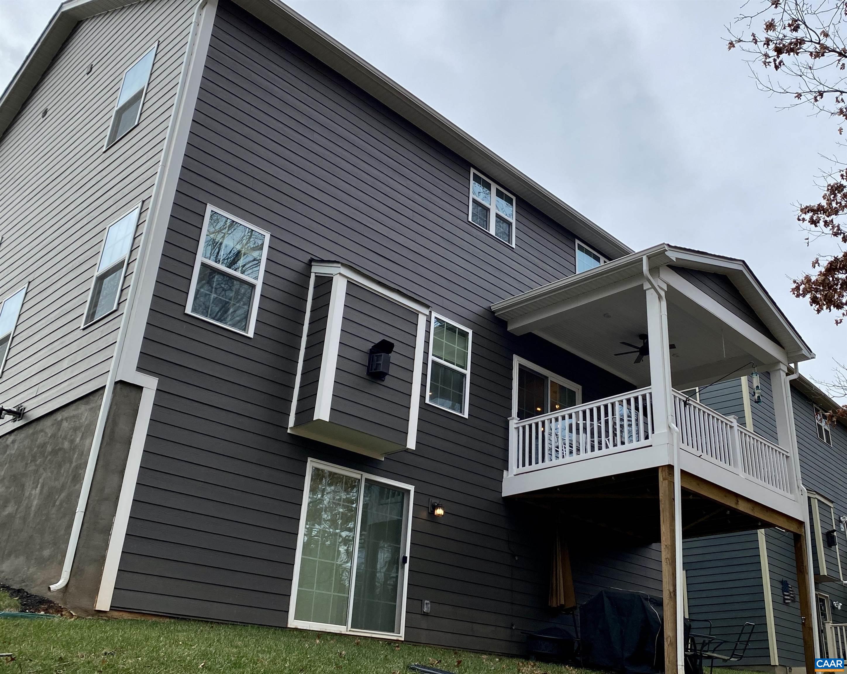 3402 Steamer Drive Keswick, VA 22947 - Photo 23 of 27 a front view of a house with a garden
