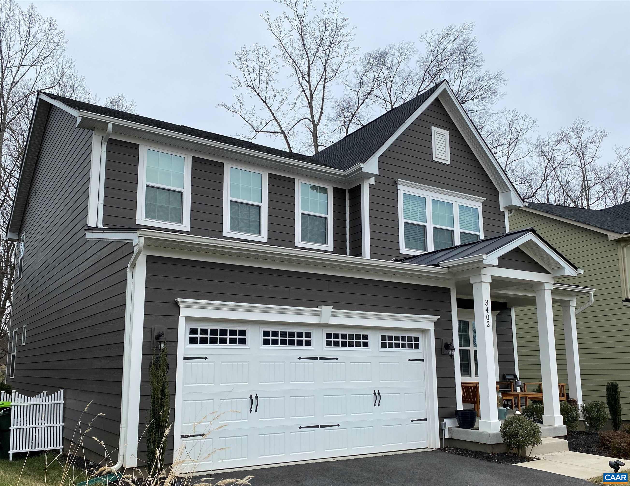 3402 Steamer Drive Keswick, VA 22947 - Photo 25 of 27 a front view of a house with a tree