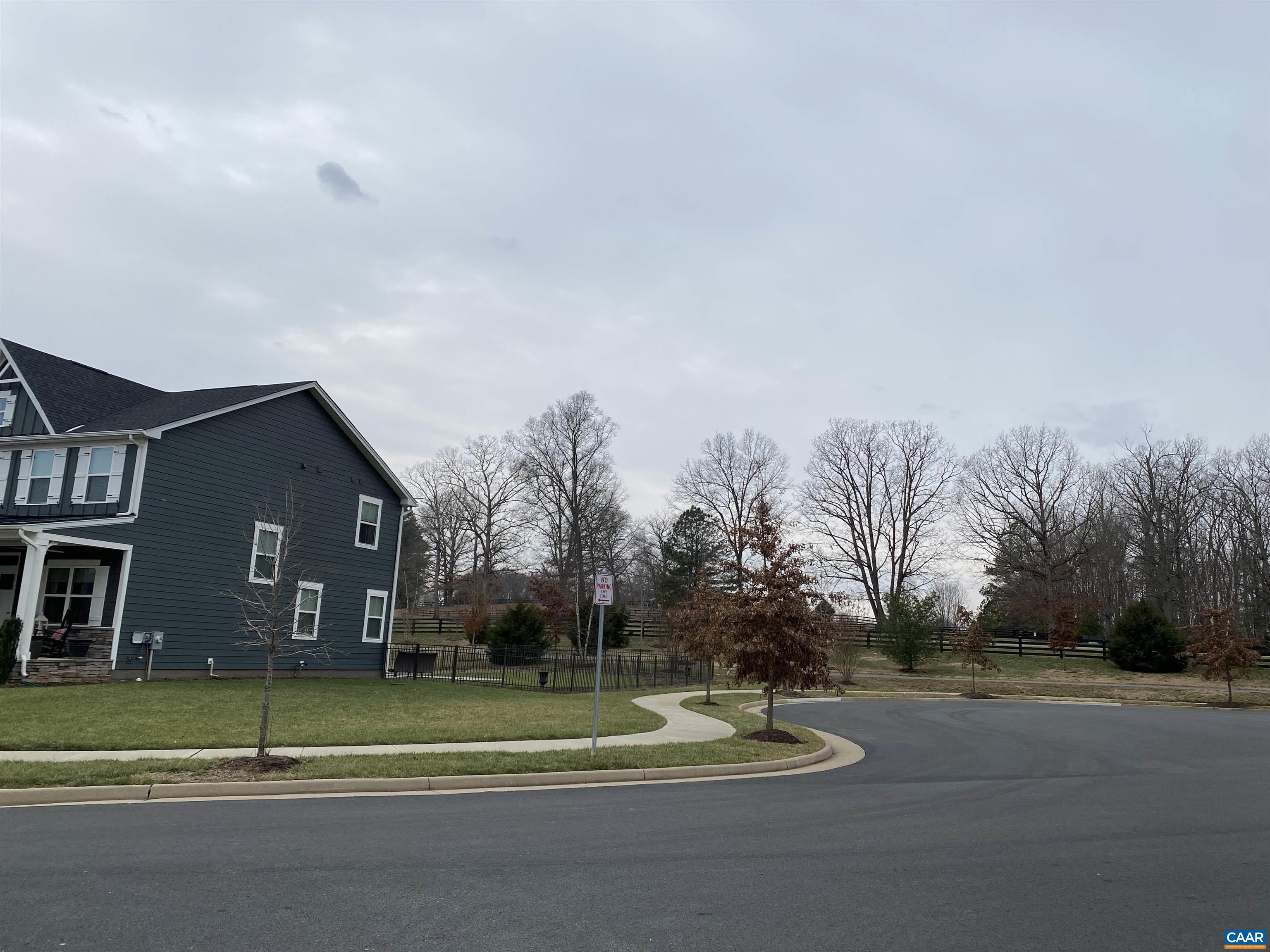 3402 Steamer Drive Keswick, VA 22947 - Photo 26 of 27 a view of a house with a yard