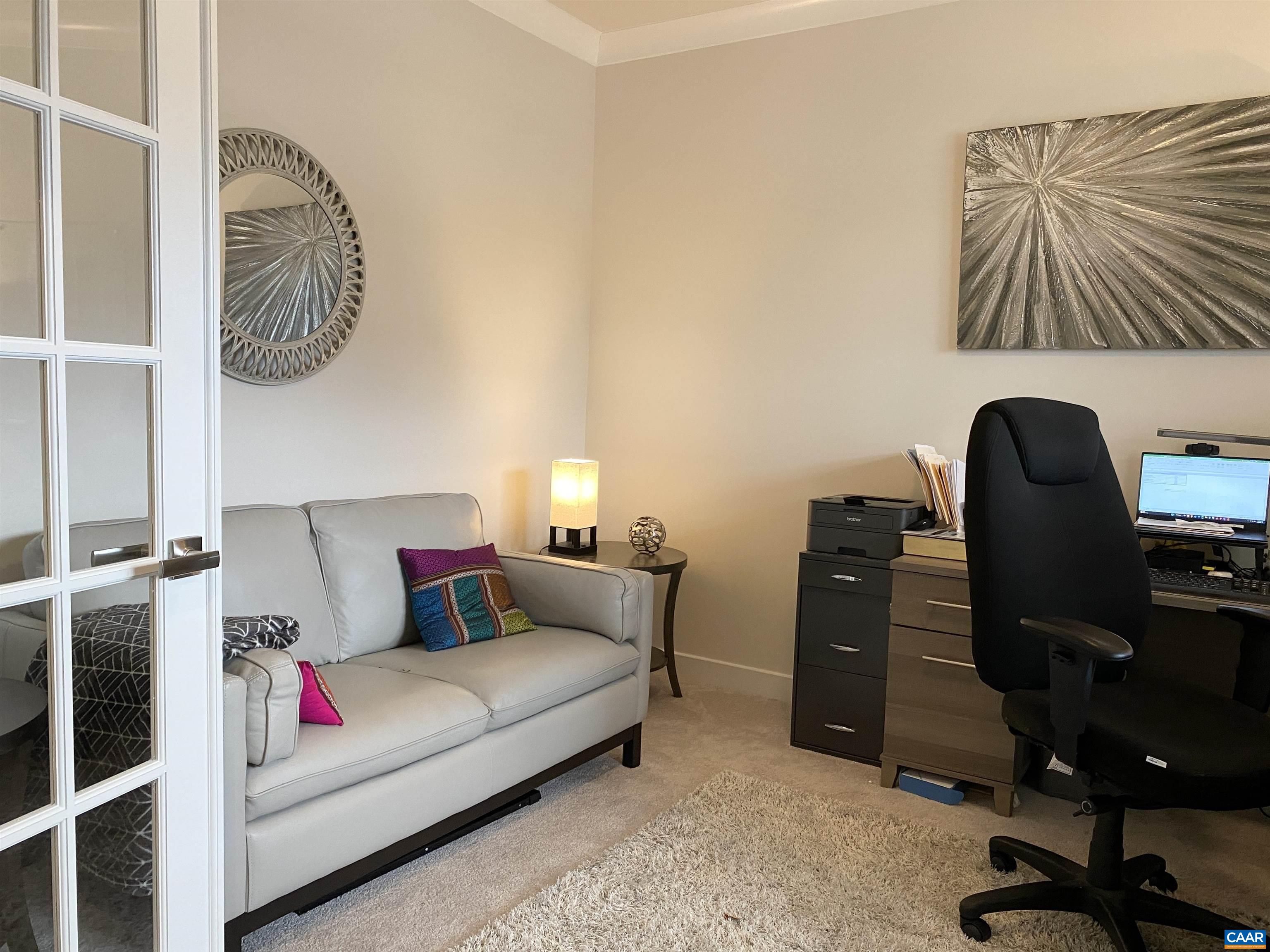3402 Steamer Drive Keswick, VA 22947 - Photo 3 of 27 a living room with furniture and a chair