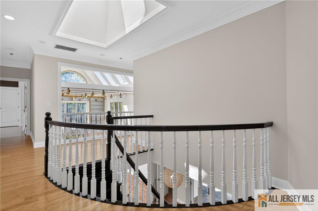 381 Monmouth Road Freehold, NJ 07728 - Photo 23 of 63 a view of entryway with wooden floor