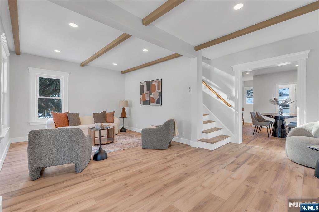 12 Enfield Avenue Montclair, NJ 07042 - Photo 11 of 50 a living room with furniture and wooden floor