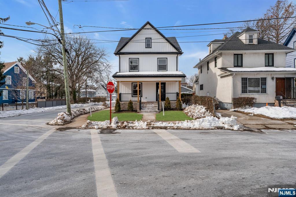 12 Enfield Avenue Montclair, NJ 07042 - Photo 2 of 50 a front view of a house with a porch