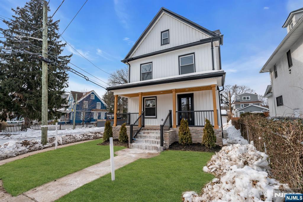 12 Enfield Avenue Montclair, NJ 07042 - Photo 3 of 50 a front view of a house with garden