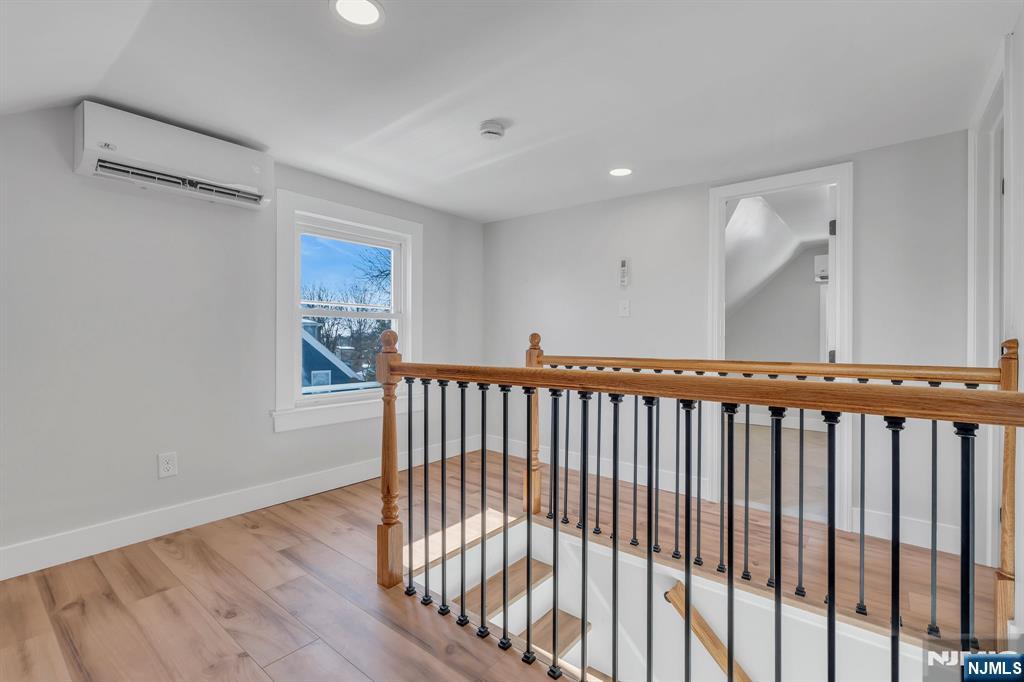 12 Enfield Avenue Montclair, NJ 07042 - Photo 36 of 50 a view of a hallway with wooden floor