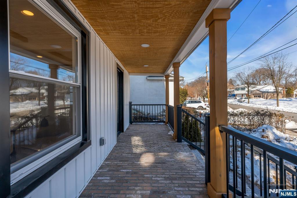 12 Enfield Avenue Montclair, NJ 07042 - Photo 4 of 50 a view of a porch with wooden floor and outdoor space