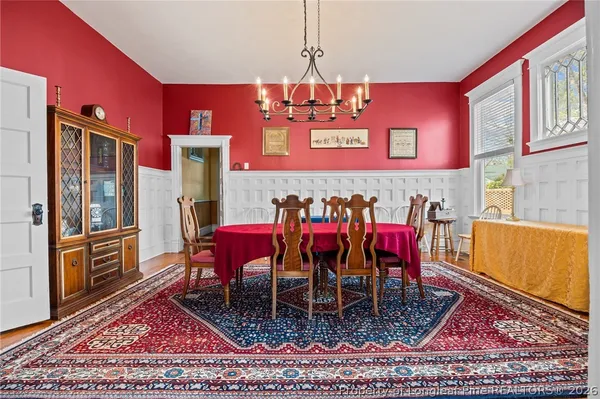 a view of a dinning room with furniture