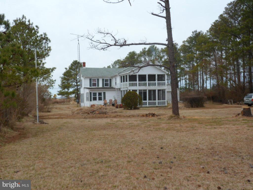 16712 Piney Point Road Piney Point, MD 20674 - Photo 11 of 29 a front view of a house with a garden