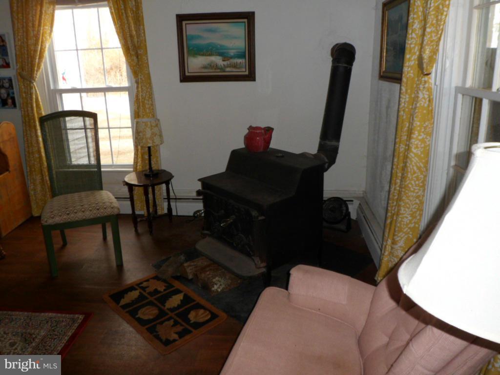 16712 Piney Point Road Piney Point, MD 20674 - Photo 18 of 29 a living room with furniture and a window