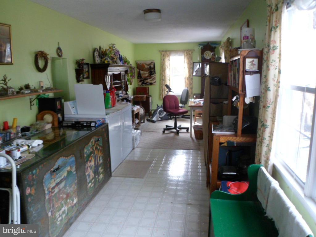 16712 Piney Point Road Piney Point, MD 20674 - Photo 20 of 29 a very nice looking room with many windows