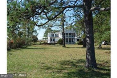 16712 Piney Point Road Piney Point, MD 20674 - Photo 3 of 29 a view of a house with backyard and trees