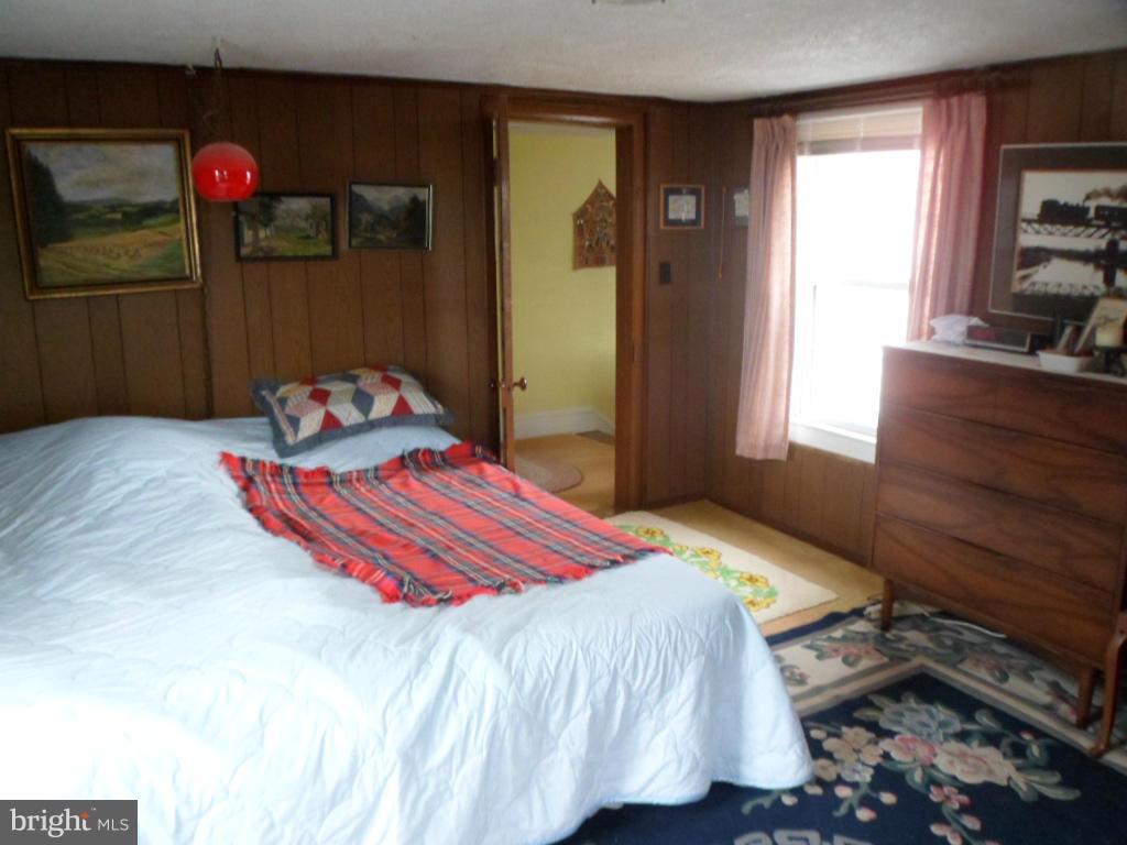 16712 Piney Point Road Piney Point, MD 20674 - Photo 29 of 29 a bedroom with a bed and a closet