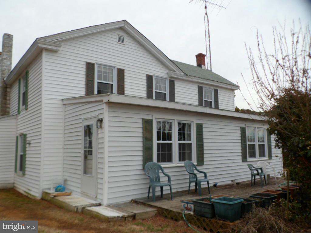16712 Piney Point Road Piney Point, MD 20674 - Photo 7 of 29 a front view of a house with a yard