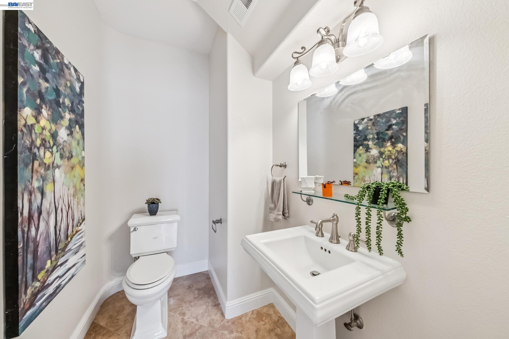 829 Lippert Place Santa Clara, CA 95050 - Photo 16 of 34 a bathroom with a sink toilet and mirror