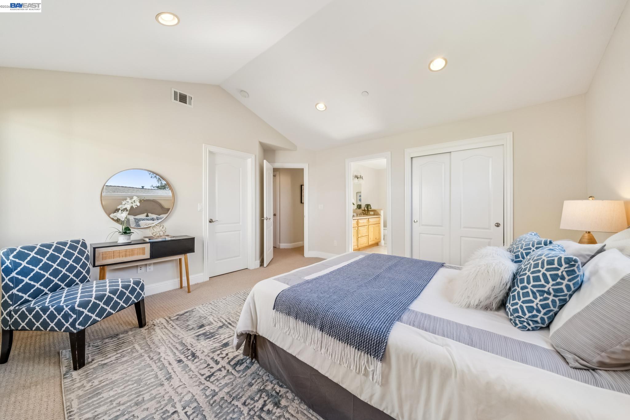 829 Lippert Place Santa Clara, CA 95050 - Photo 20 of 34 a bedroom with a bed and dresser with mirror