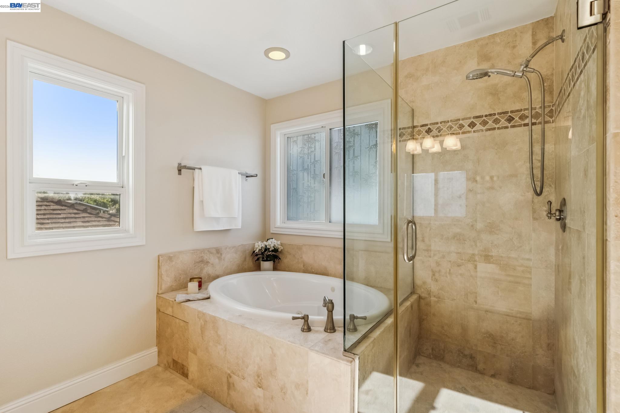 829 Lippert Place Santa Clara, CA 95050 - Photo 23 of 34 a bathroom with a tub and shower