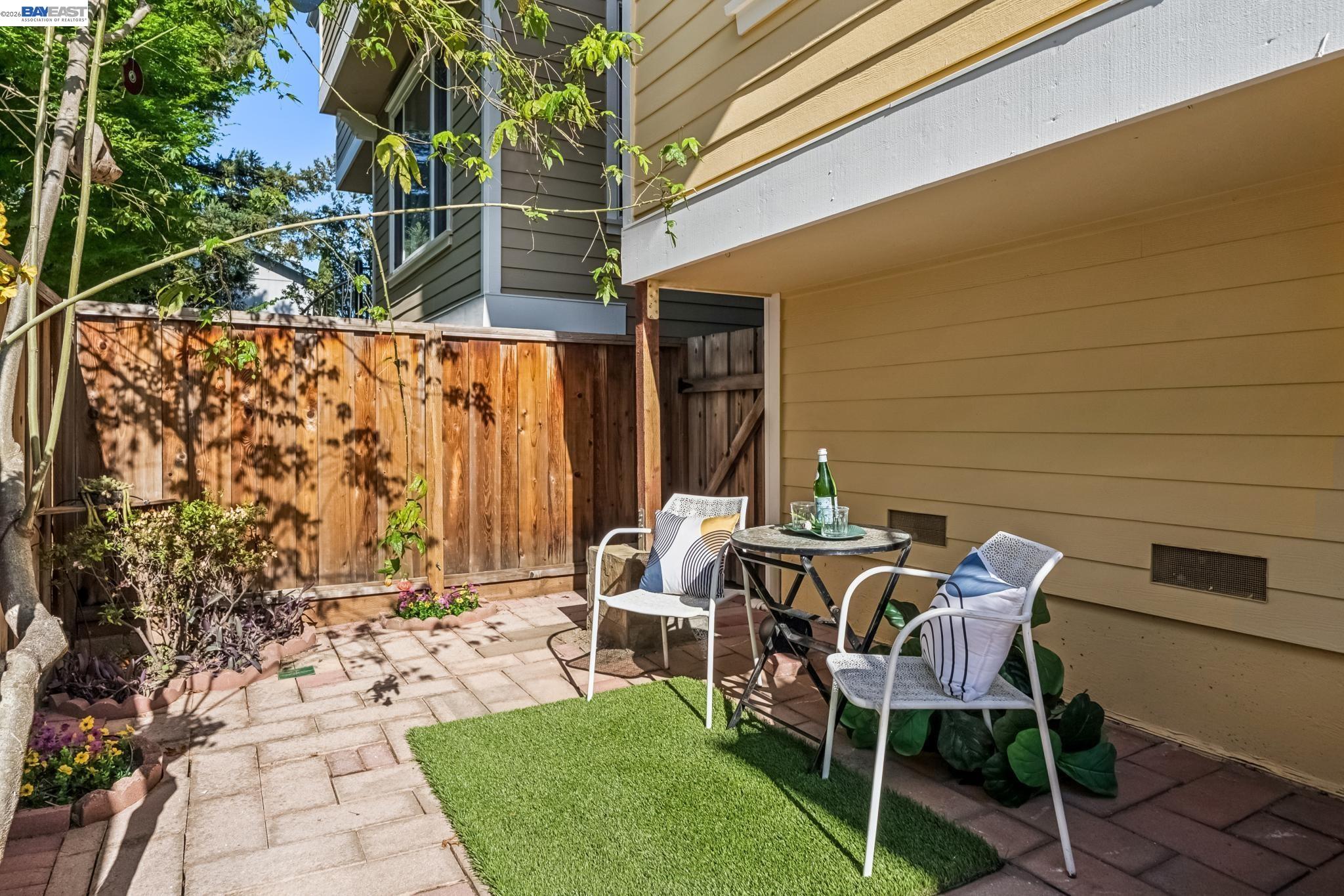 829 Lippert Place Santa Clara, CA 95050 - Photo 31 of 34 a view of backyard with table and chairs and potted plants