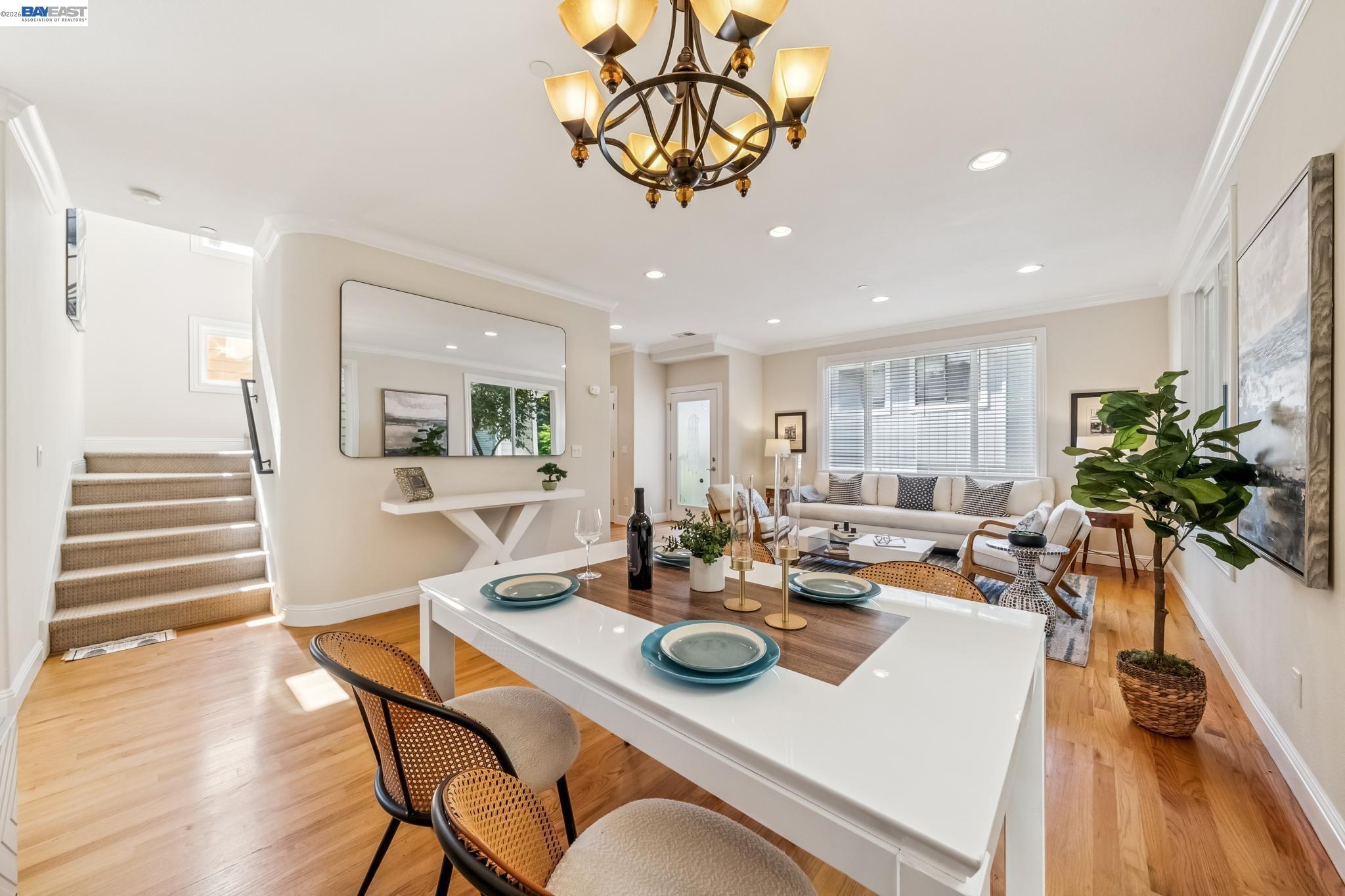 829 Lippert Place Santa Clara, CA 95050 - Photo 8 of 34 a view of a dining room with furniture a chandelier and wooden floor